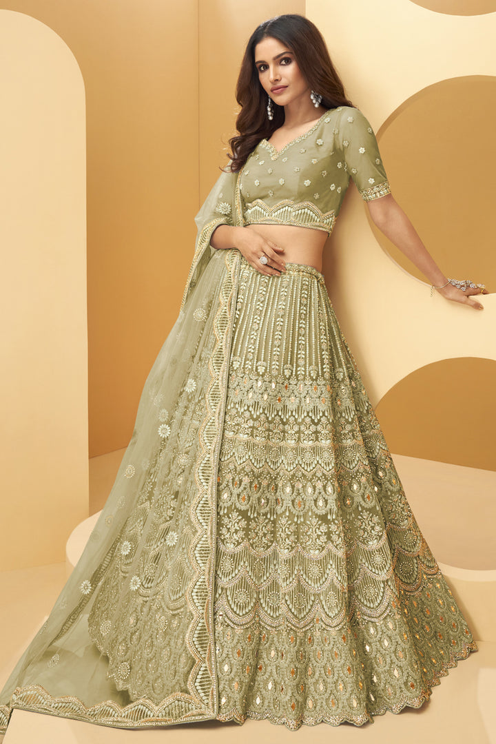 Embroidered Wedding Wear Designer Lehenga Choli In Beige Color Net Fabric