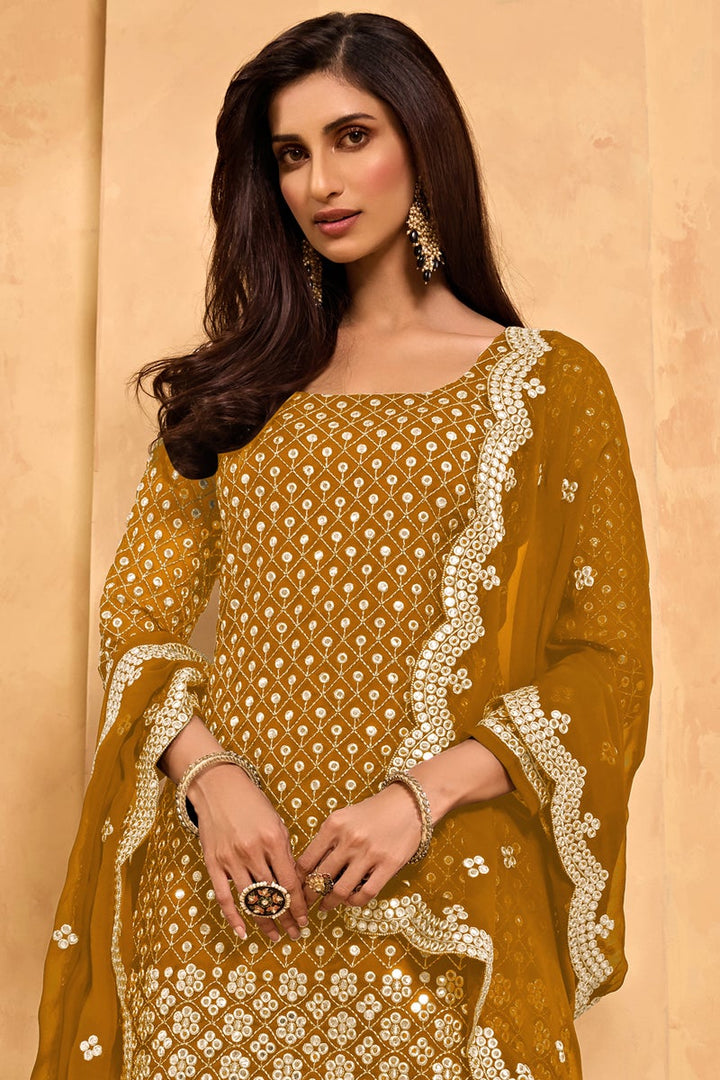 Sangeet Wear Georgette Fabric Embroidered Sharara Suit In Mustard Color