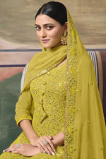 Load image into Gallery viewer, Sangeet Wear Yellow Color Sober Sharara Suit In Georgette Fabric
