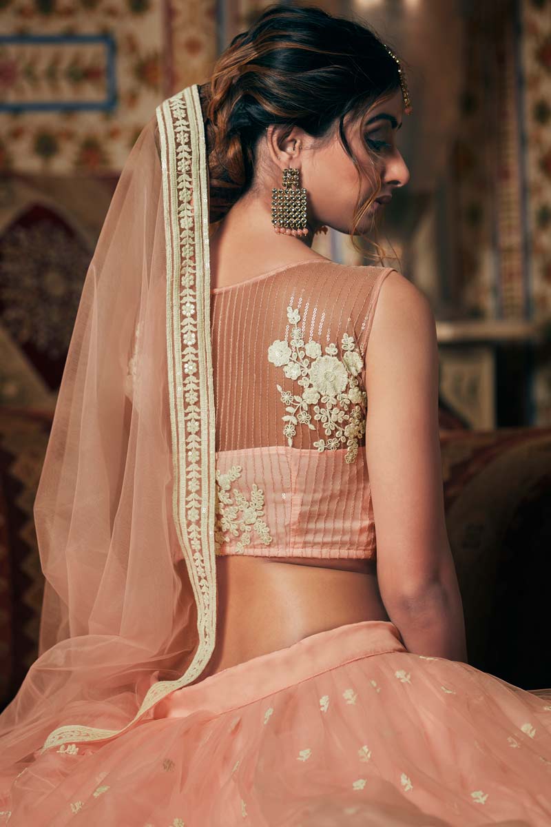 Magnificent Sangeet Wear Net Fabric Peach Color Embroidered Work Lehenga