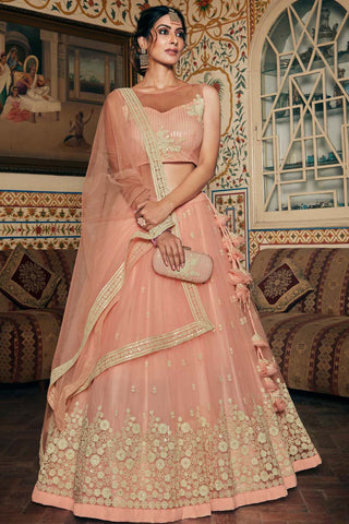 Magnificent Sangeet Wear Net Fabric Peach Color Embroidered Work Lehenga