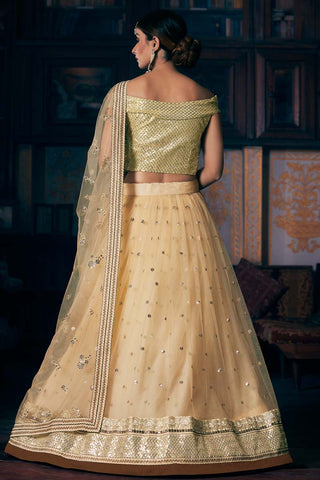 Net Fabric Brilliant Sangeet Wear Embroidered Work Lehenga In Cream Color