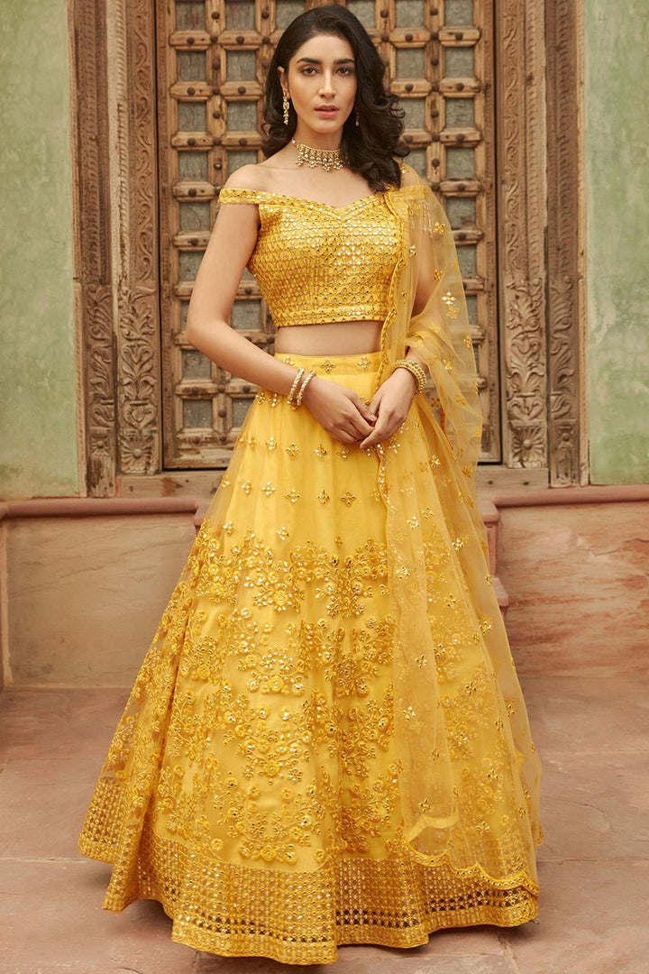 Organza Fabric Yellow Color Fetching Embroidered Function Wear Lehenga Choli