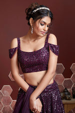 Load image into Gallery viewer, Sangeet Wear Wine Color Appealing Embroidered Work Lehenga In Net Fabric

