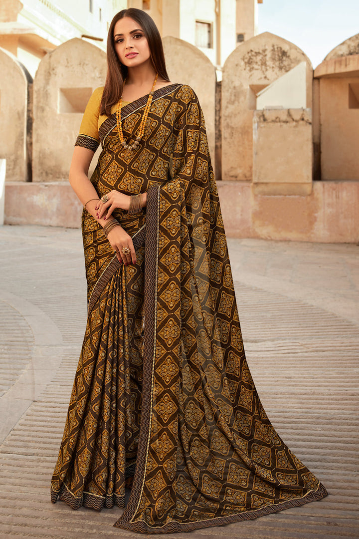 Asmita Sood Fancy Fabric Brown Color Coveted Saree