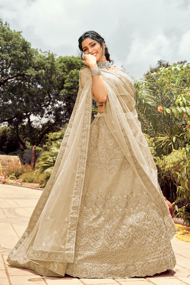 Attractive Embroidered Work On Designer Bridal Lehenga In Beige Color Art Silk Fabric