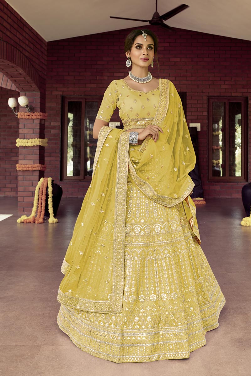 Embroidered Work On Yellow Color Wedding Wear Classic Bridal Lehenga In Art Silk Fabric