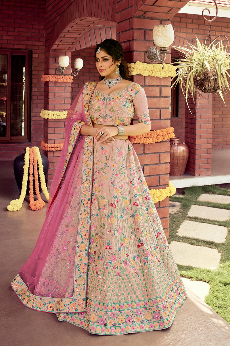 Art Silk Fabric Peach Color Wedding Wear Embroidered Work Bridal Lehenga