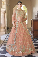 Load image into Gallery viewer, Peach Color Embroidered Sangeet Wear Lehenga Choli In Net Fabric
