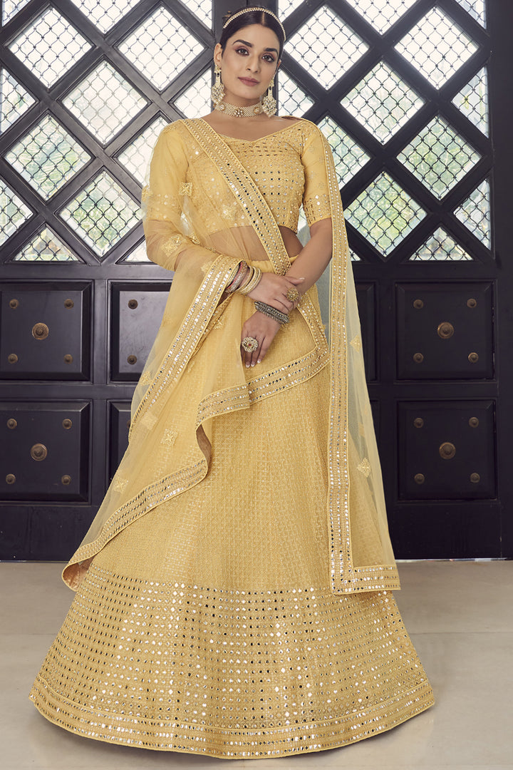 Marvelous Embroidered Work On Georgette Fabric Sangeet Wear Lehenga In Yellow Color