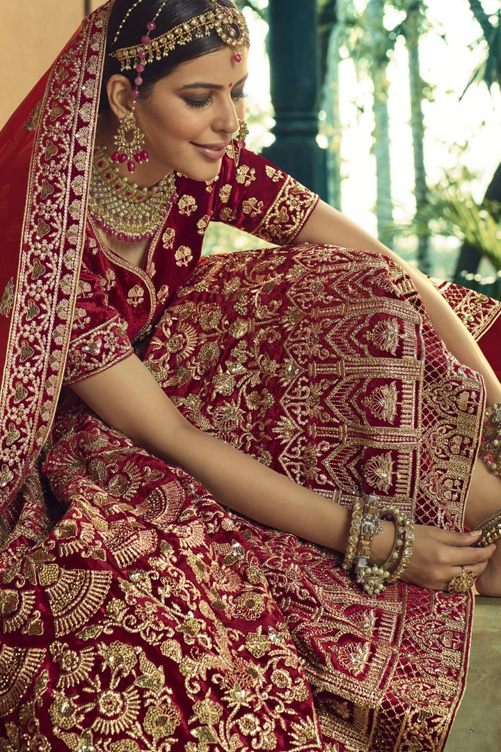 Velvet Fabric Maroon Color Embroidered Wedding Wear Designer Lehenga Choli