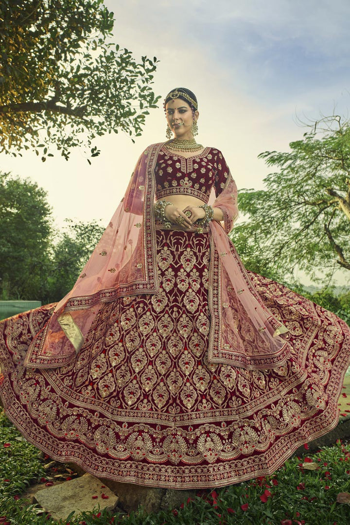 Embroidered Maroon Color Wedding Wear Fancy Lehenga Choli In Velvet Fabric