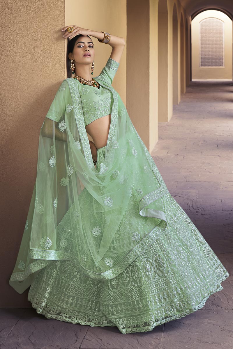 Net Fabric Fancy Wedding Wear Lehenga Choli In Sea Green Color