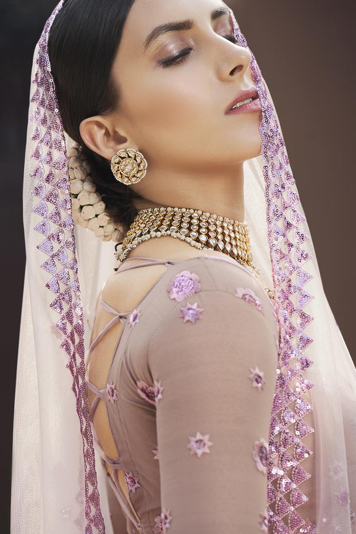 Lavender Color Reception Wear Lehenga Choli In Net Fabric