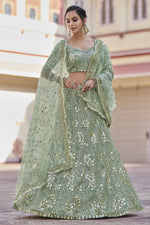 Load image into Gallery viewer, Net Fabric Reception Wear Sea Green Color Sequins Work Lehenga Choli
