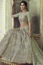 Load image into Gallery viewer, Sea Green Color Sequins Work Wedding Wear Lehenga Choli In Net Fabric
