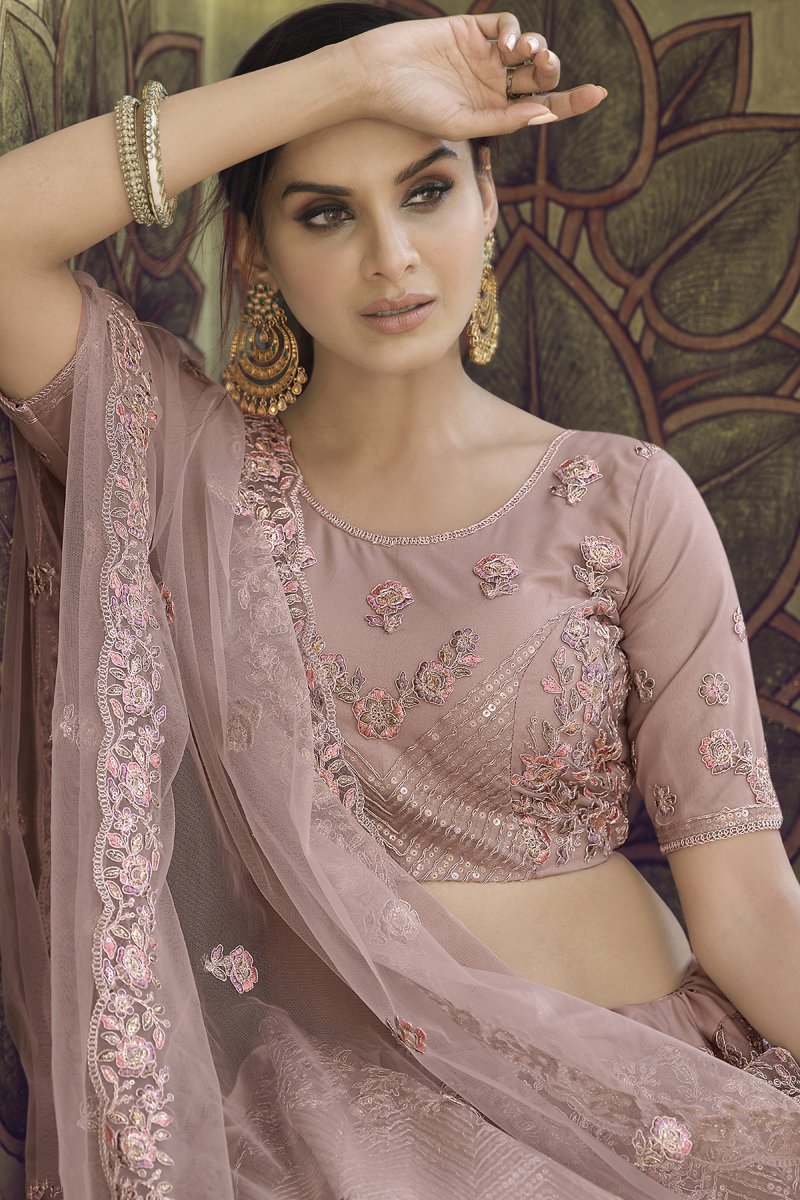 Wedding Wear Net Fabric Sequins Work Lehenga Choli In Pink Color