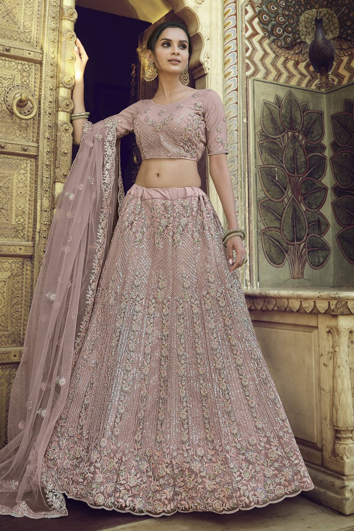 Wedding Wear Net Fabric Sequins Work Lehenga Choli In Pink Color