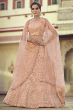 Load image into Gallery viewer, Reception Wear Net Fabric Peach Color Sequins Work Lehenga Choli
