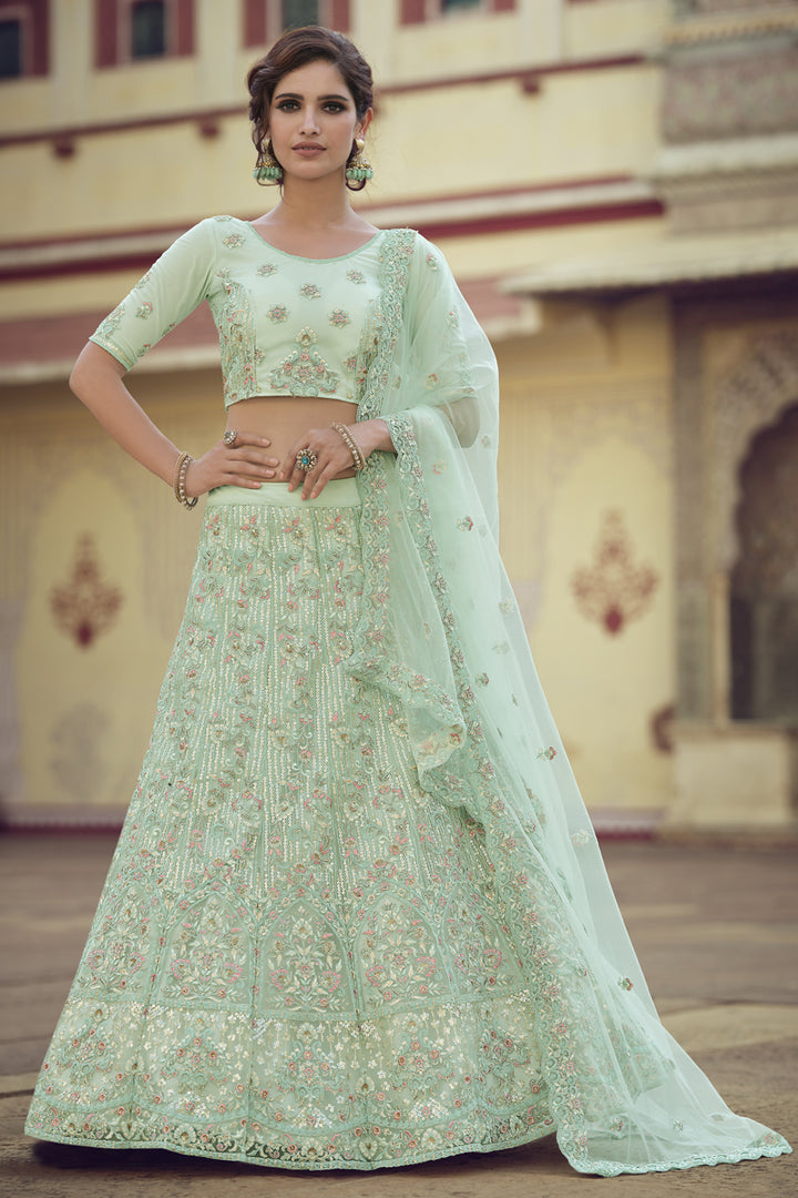 Net Fabric Sangeet Wear Sea Green Color Sequins Work Lehenga Choli