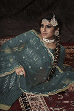 Load image into Gallery viewer, Function Wear Net Fabric Cyan Color Excellent Sharara Suit With Sequins Work
