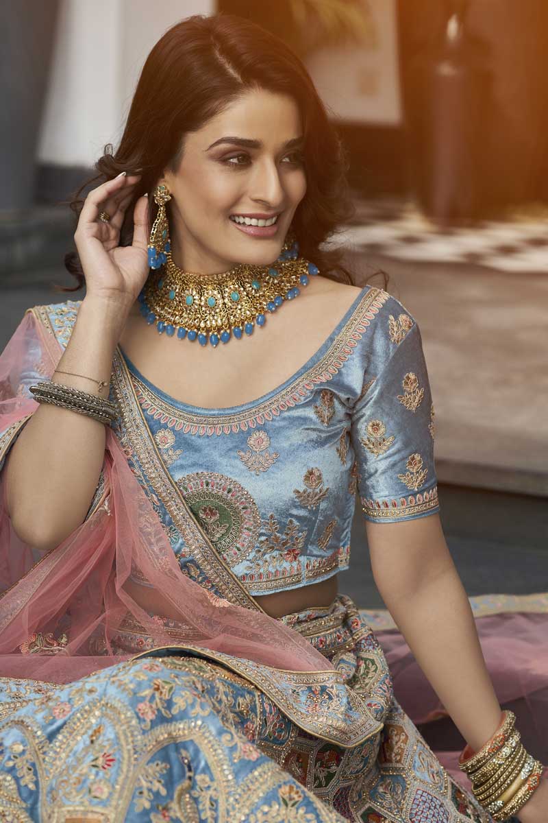 Light Cyan Color Alluring Velvet Fabric Function Wear Lehenga With Embroidered Work