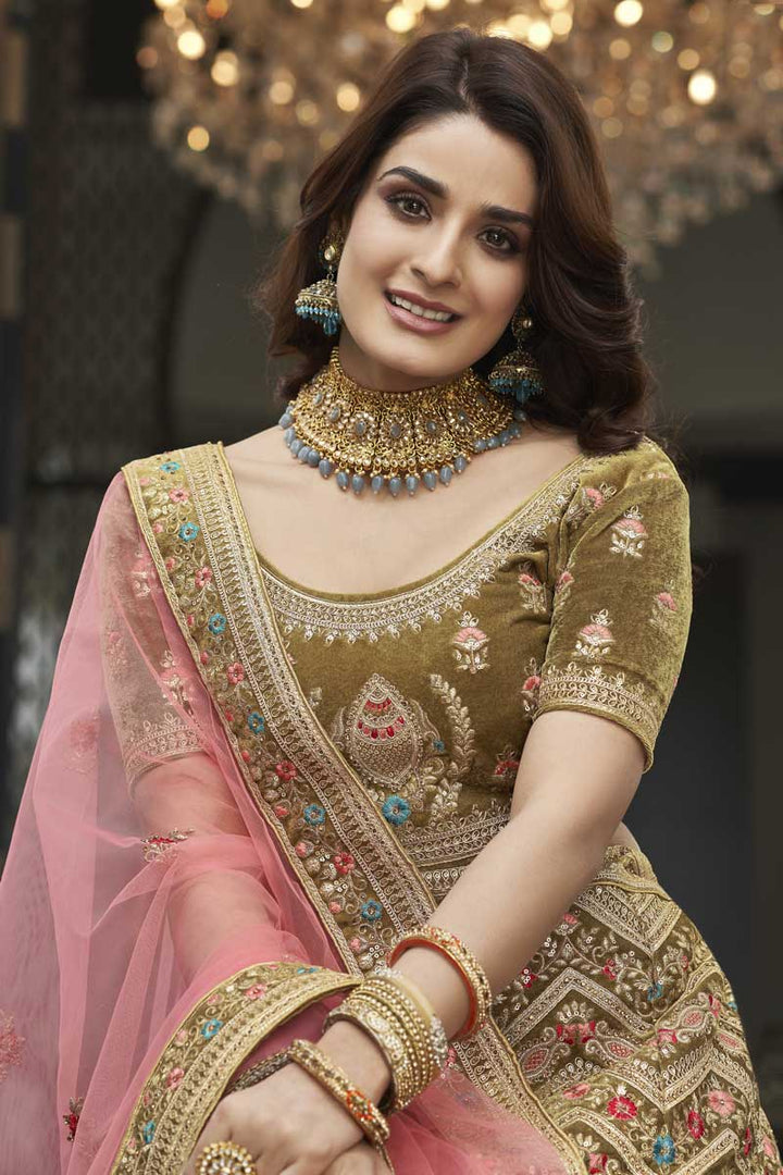 Beautiful Mehendi Green Color Velvet Fabric Function Wear Lehenga With Embroidered Work