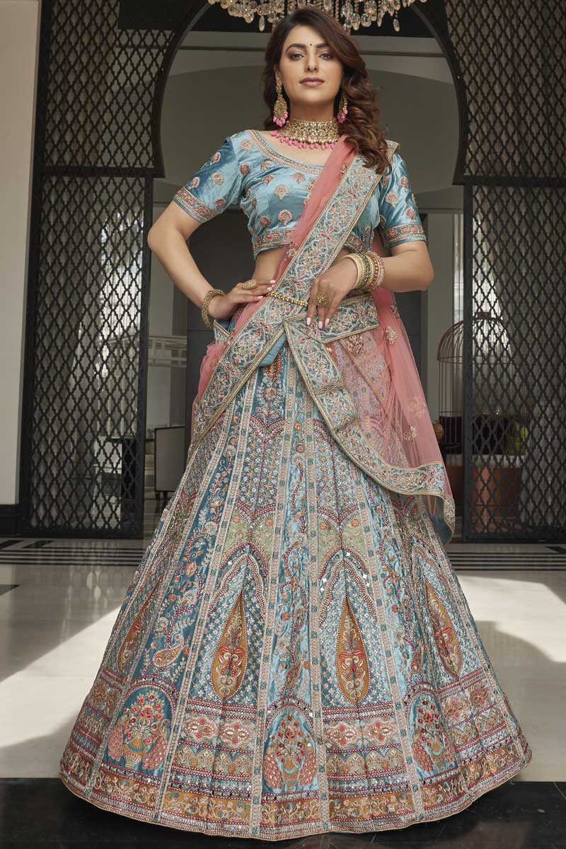 Cyan Color Dazzling Velvet Fabric Function Wear Lehenga With Embroidered Work