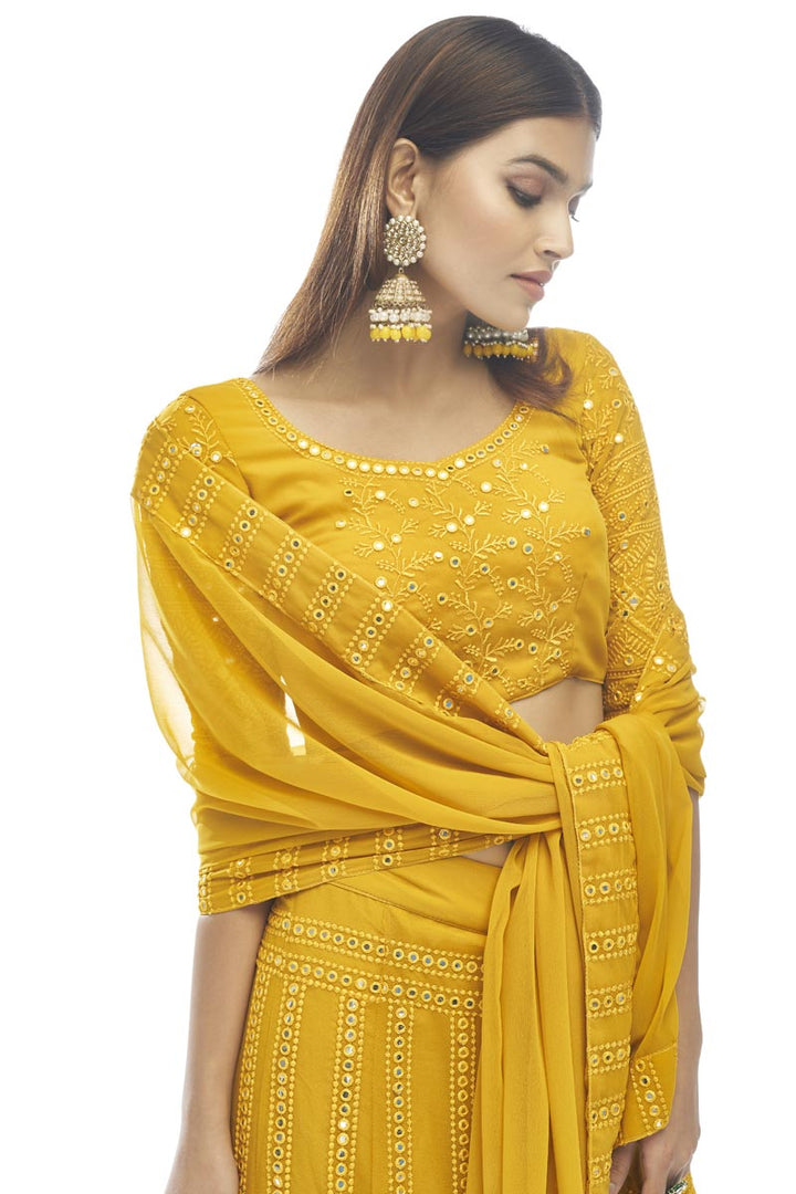 Georgette Fabric Yellow Color Imperial Lehenga With Embroidered Work