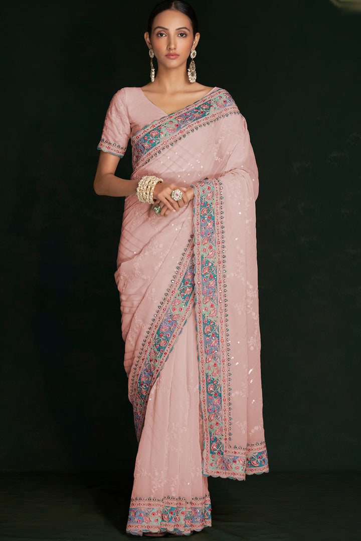 Fashionable Peach Georgette Saree With Rich Lucknowi Work