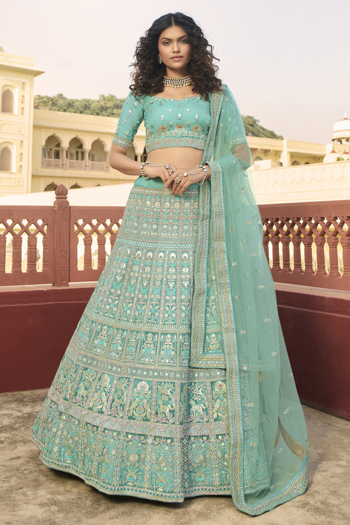 Designer Embroidered Wedding Wear Lehenga Choli In Cyan Color Organza Fabric
