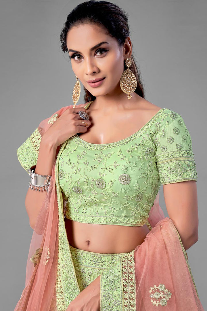 Sea Green Color Thread Embroidered Net Fabric Wedding Wear Lehenga Choli