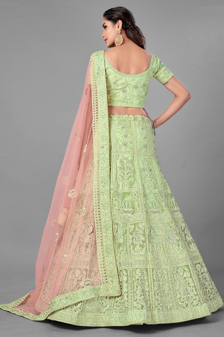 Sea Green Color Thread Embroidered Net Fabric Wedding Wear Lehenga Choli