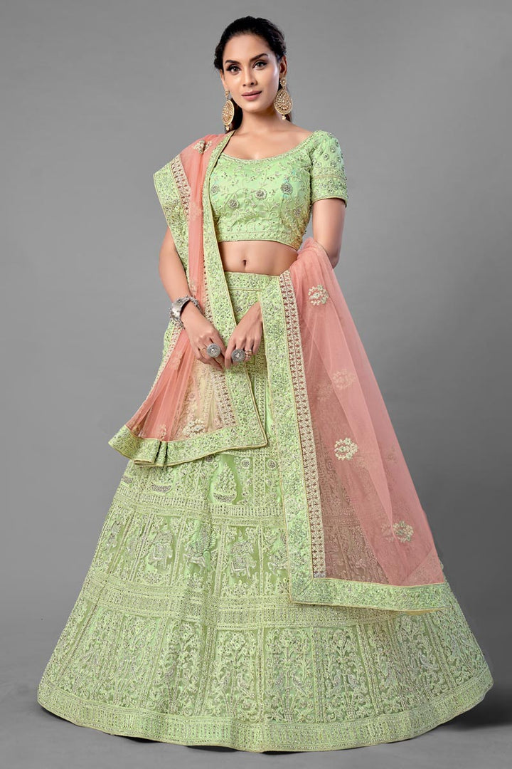Sea Green Color Thread Embroidered Net Fabric Wedding Wear Lehenga Choli