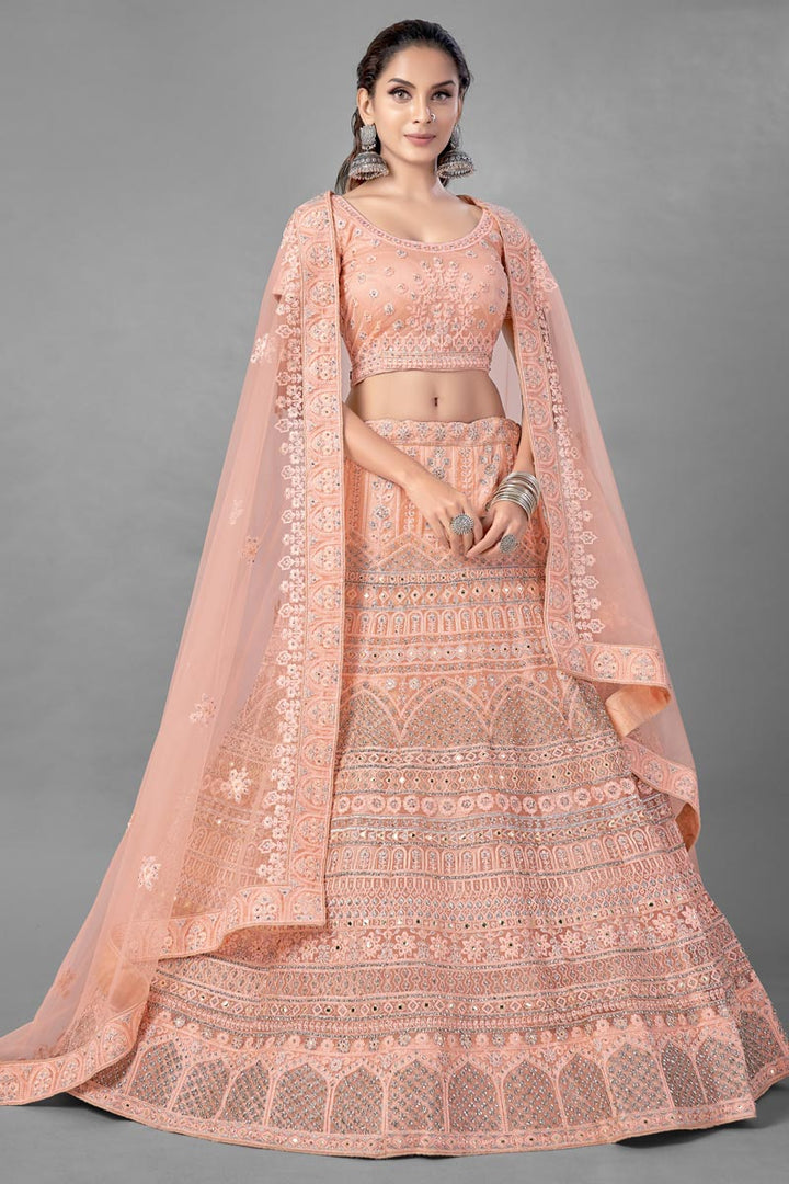 Peach Color Thread Embroidered Designer Wedding Wear Net Fabric Lehenga Choli