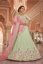 Load image into Gallery viewer, Georgette Fascinate Embroidered Reception Wear Lehenga Choli In Sea Green Color
