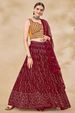 Load image into Gallery viewer, Sangeet Wear Maroon Color Engaging Georgette Lehenga With Sequins Work
