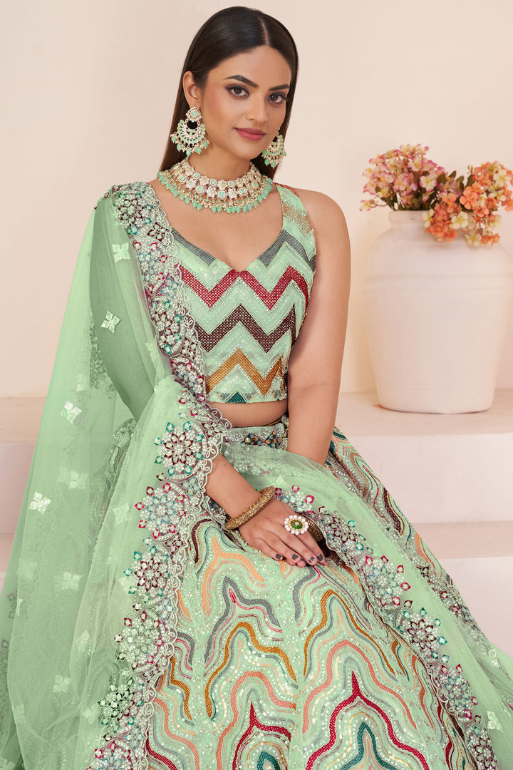 Net Fabric Wedding Wear 3 Piece Lehenga Choli In Sea Green Color With Embroidery Work