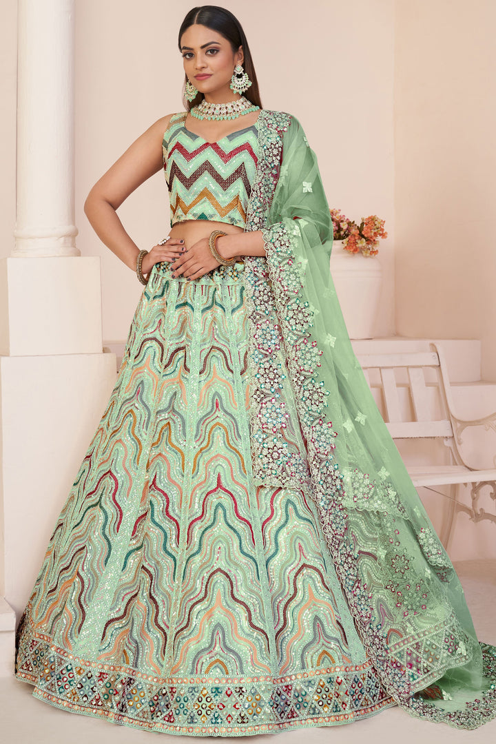 Net Fabric Wedding Wear 3 Piece Lehenga Choli In Sea Green Color With Embroidery Work