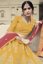 Load image into Gallery viewer, Gorgeous Embroidered Yellow Lehenga Choli In Satin Fabric
