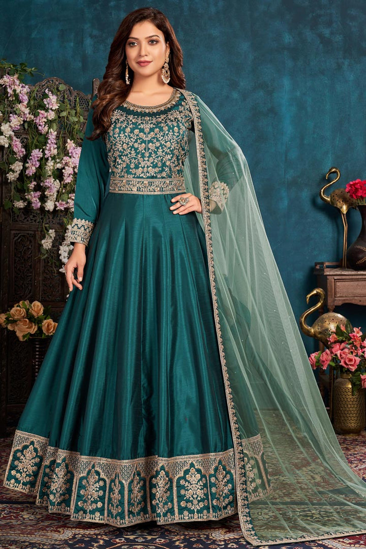 Sangeet Wear Art Sirk Fabric Embroidered Teal Color Anarkali Suit