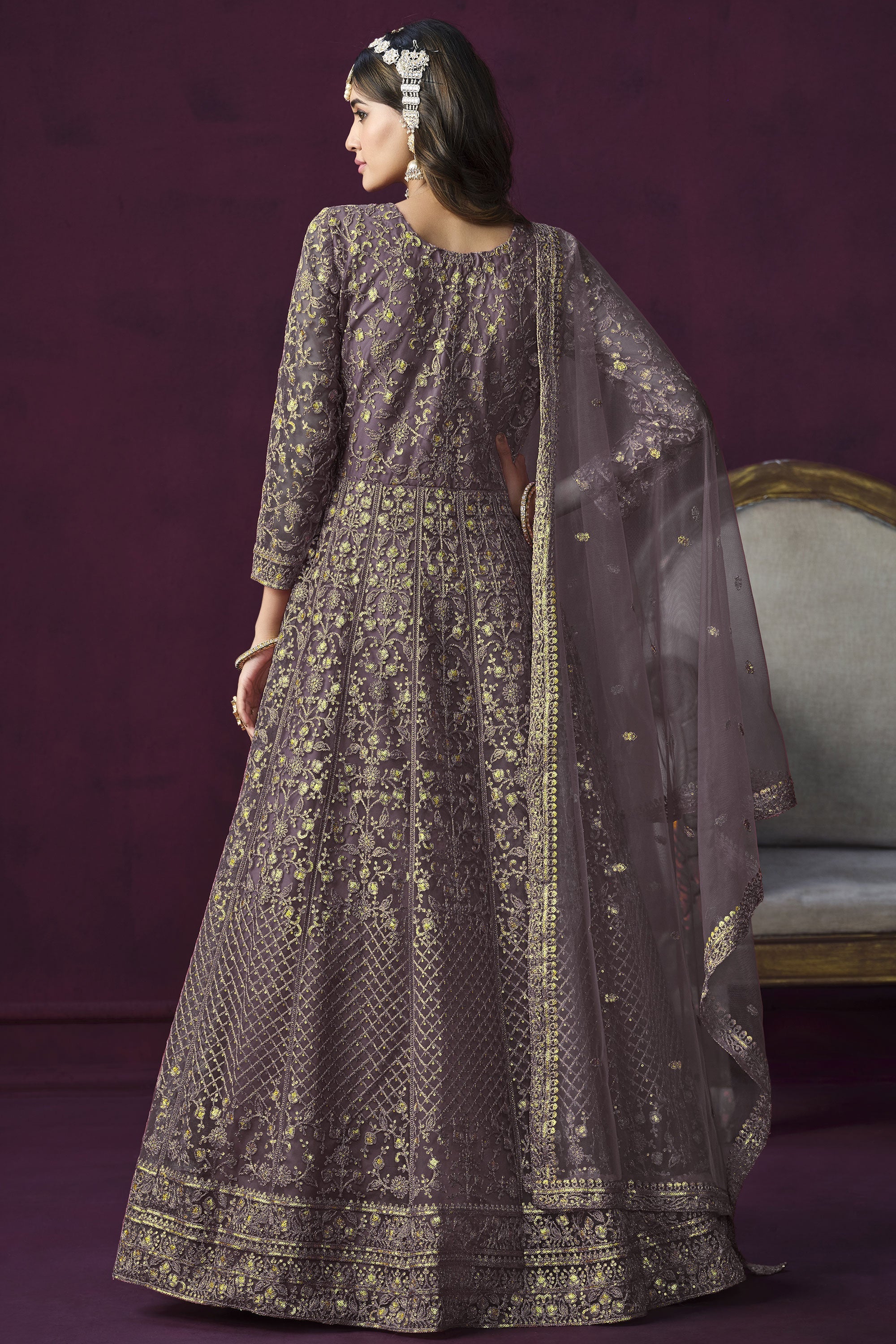 Attractive Embroidered Lavender Color Anarkali Suit In Net Fabric