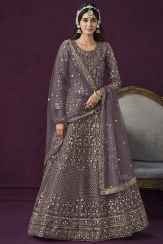 Attractive Embroidered Lavender Color Anarkali Suit In Net Fabric