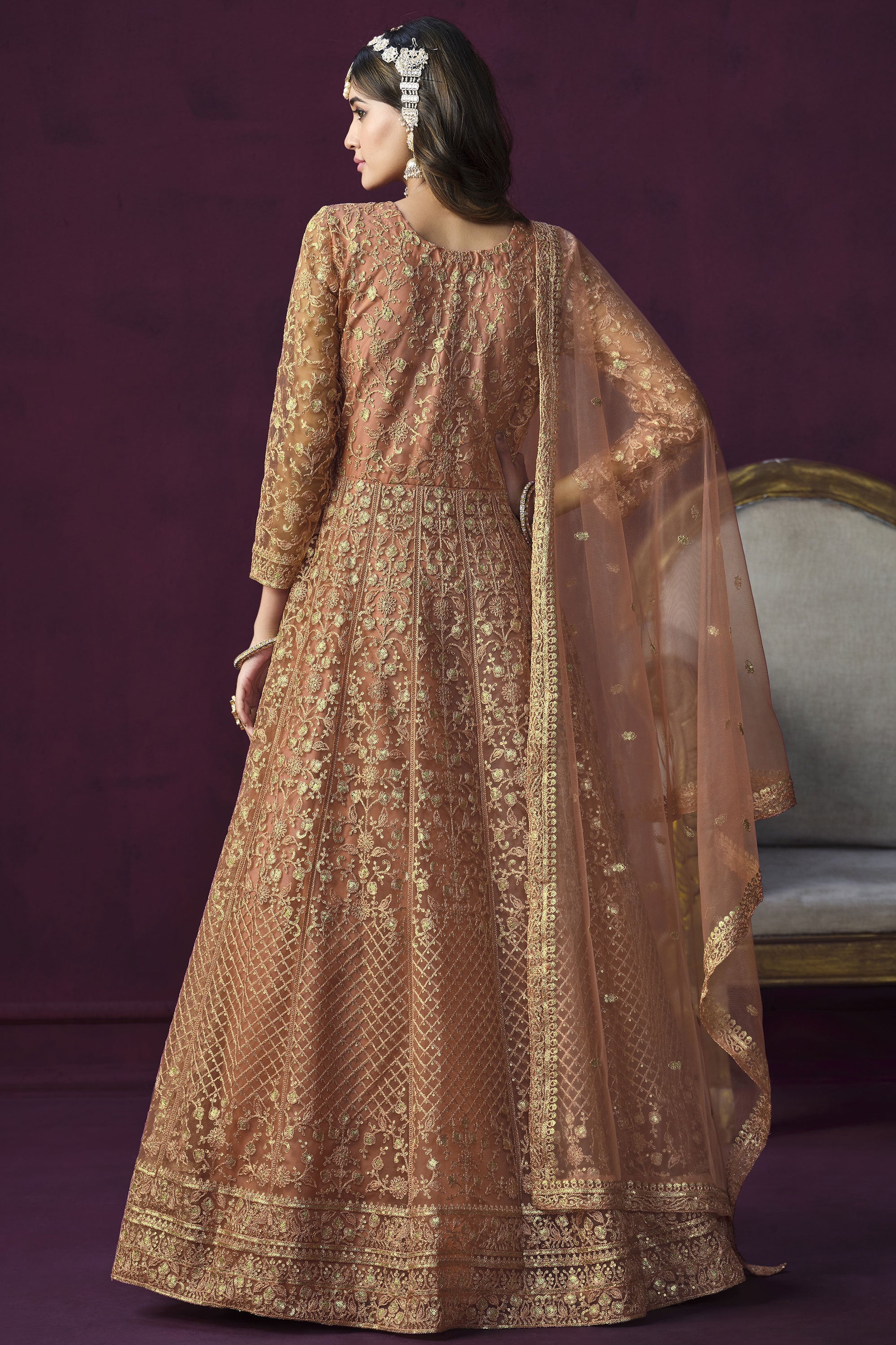 Beautiful Peach Color Embroidered Anarkali Suit In Net Fabric