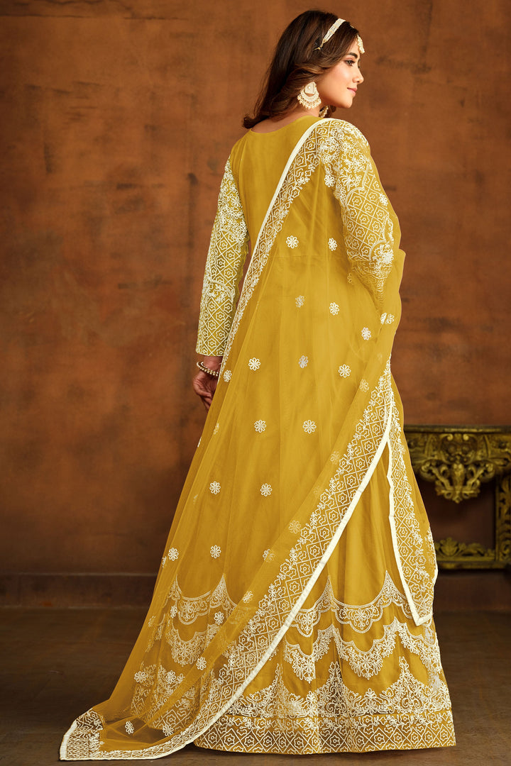 Net Fabric Fancy Embroidered Festive Wear Anarkali Suit In Yellow Color
