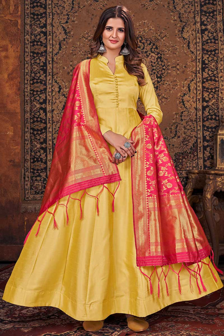 Radiant Yellow Color Art Silk Fabric Anarkali Suit With Contrast Dupatta