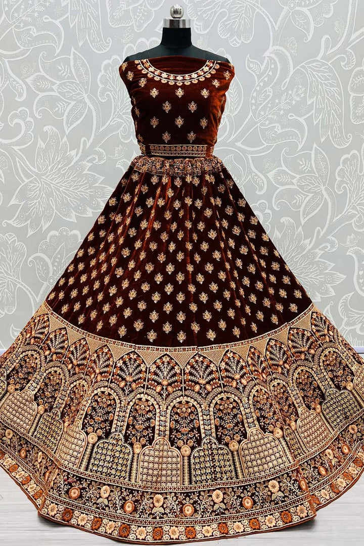 Velvet Fabric Wedding Wear Thread Embroidered Work Precious Bridal Lehenga Choli In Brown Color