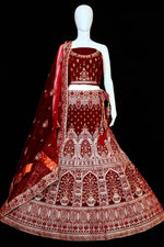 Load image into Gallery viewer, Charismatic Maroon Color Wedding Wear Embroidered Work Bridal Lehenga In Velvet Fabric
