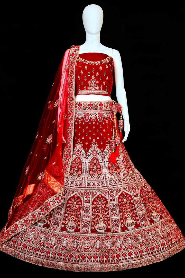 Embroidered Work On Red Color Wedding Wear Velvet Fabric Ingenious Bridal Lehenga