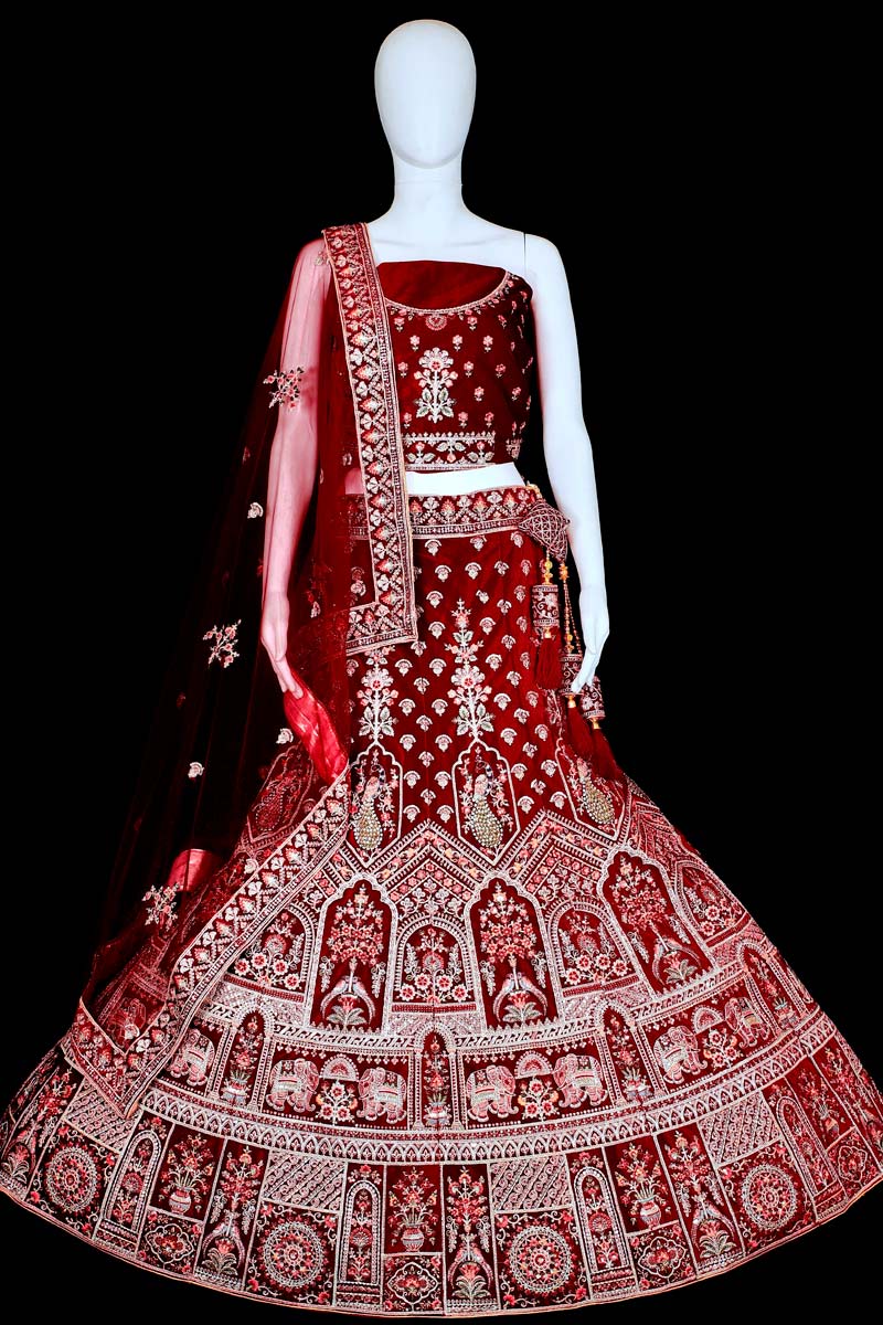 Wedding Wear Velvet Fabric Maroon Color Stunning Bridal Lehenga With Embroidered Work